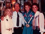 At the Opry on June 10, 1983, with Connie Smith (wearing a Jan Howard button), Roy Acuff, and Reba McEntire